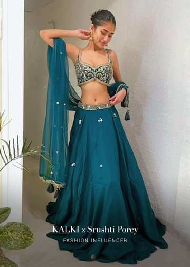 Srushti Porey In Kalki Pine Green Lehenga Choli In Raw Silk With Butti Work And Heavy Hand Embroidery In Mughal Motifs On The Choli