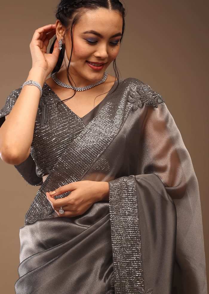 Steel Grey Tissue Organza Saree With Sequin Embroidery Blouse Crafted In Satin With A V Neckline