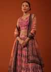 Tangerine Orange Ajrakh Printed Lehenga And Blouse Set In Chinon