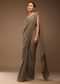 Taupe Grey Ready-Pleated Saree With A Crop Top In Foil Applique Embellishment Sleeveless With A Tie-Up Tassel Dori At The Back.