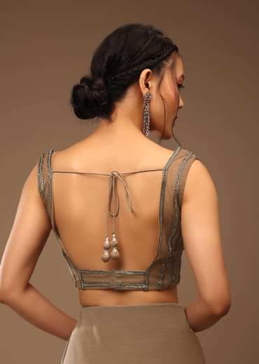 Taupe Grey Ready-Pleated Saree With A Crop Top In Foil Applique Embellishment Sleeveless With A Tie-Up Tassel Dori At The Back.