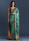 Teal Blue Dola Silk Saree With Nature Motifs And Embroidery
