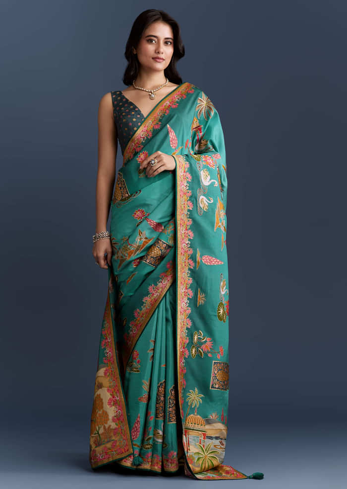 Teal Blue Dola Silk Saree With Nature Motifs And Embroidery