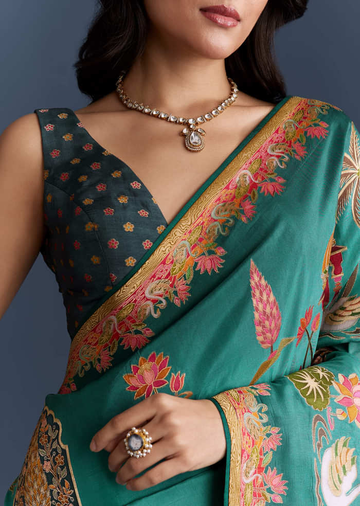 Teal Blue Dola Silk Saree With Nature Motifs And Embroidery