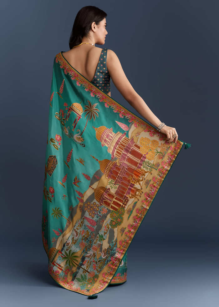 Teal Blue Dola Silk Saree With Nature Motifs And Embroidery