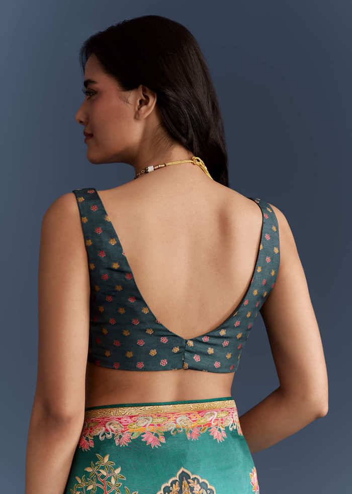 Teal Blue Dola Silk Saree With Nature Motifs And Embroidery