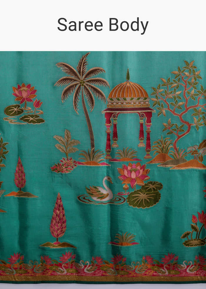 Teal Blue Dola Silk Saree With Nature Motifs And Embroidery