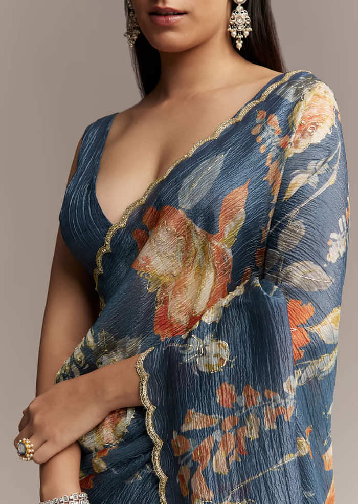 Teal Blue Tissue Saree With Floral Print And Embroidered Border