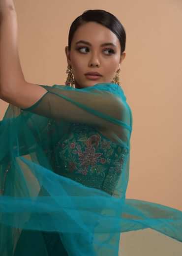 Teal Drape Skirt And Crop Top With Matching Cape And Colorful Resham Embroidered Spring Blooms