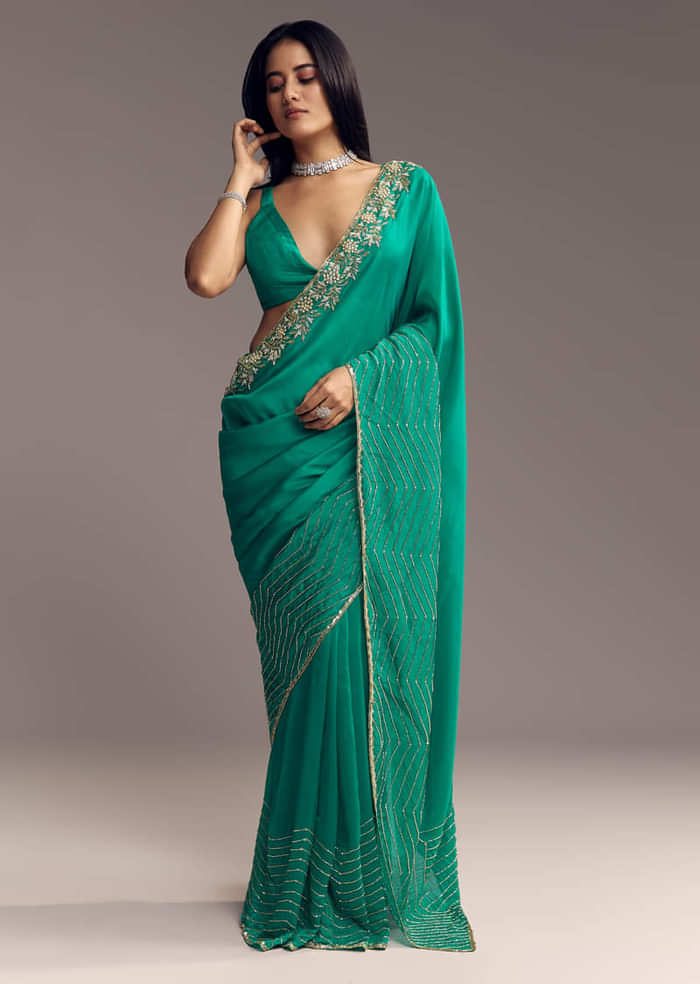 Teal Green Organza Saree With Cut Dana And Sequin Detailing