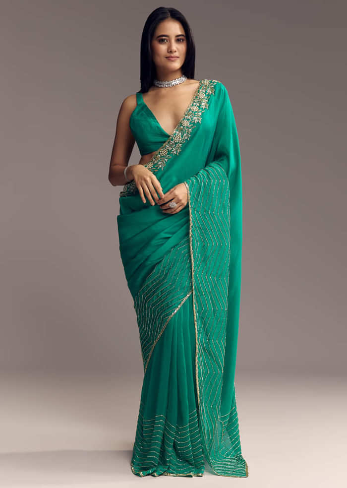 Teal Green Organza Saree With Cut Dana And Sequin Detailing