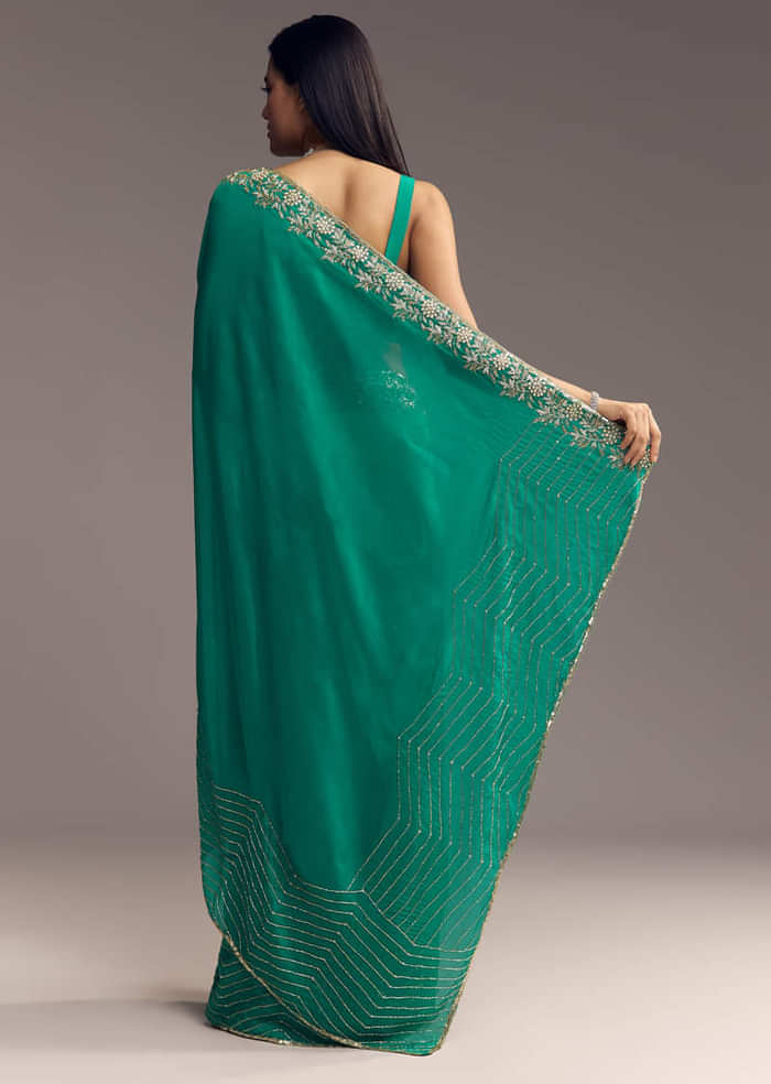 Teal Green Organza Saree With Cut Dana And Sequin Detailing
