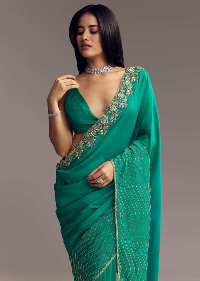 Teal Green Organza Saree With Cut Dana And Sequin Detailing