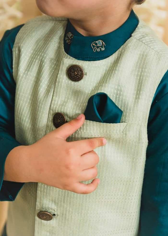 Kalki Boys Teal Kurta Set With Elephant Motifs And Green Nehru Jacket With Kantha Work By Tiber Taber
