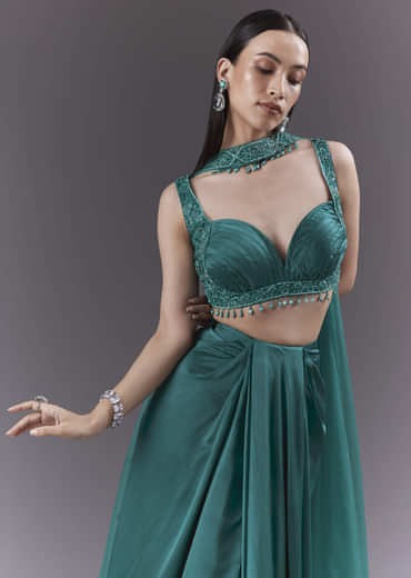 Teal Satin Crop Top And Drape Skirt Set With Heavy Embroidery