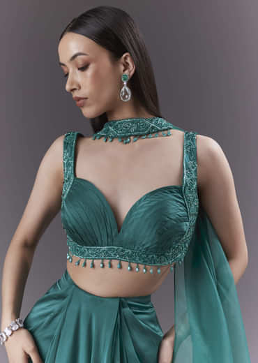 Teal Satin Crop Top And Drape Skirt Set With Heavy Embroidery