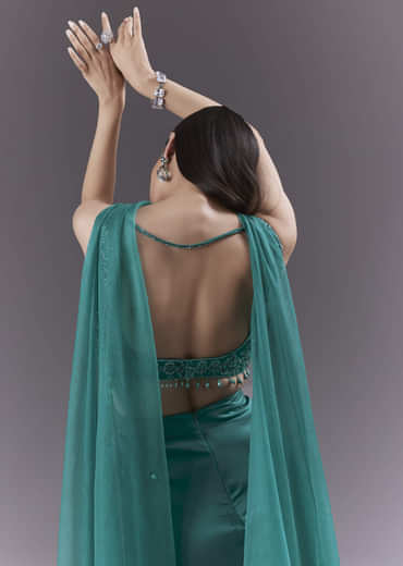 Teal Satin Crop Top And Drape Skirt Set With Heavy Embroidery