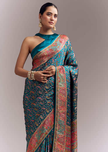 Teal Blue Satin Woven Saree With Multicolour Traditional Motifs Teal Blue Satin Woven Saree With Multicolour Traditional Motifs