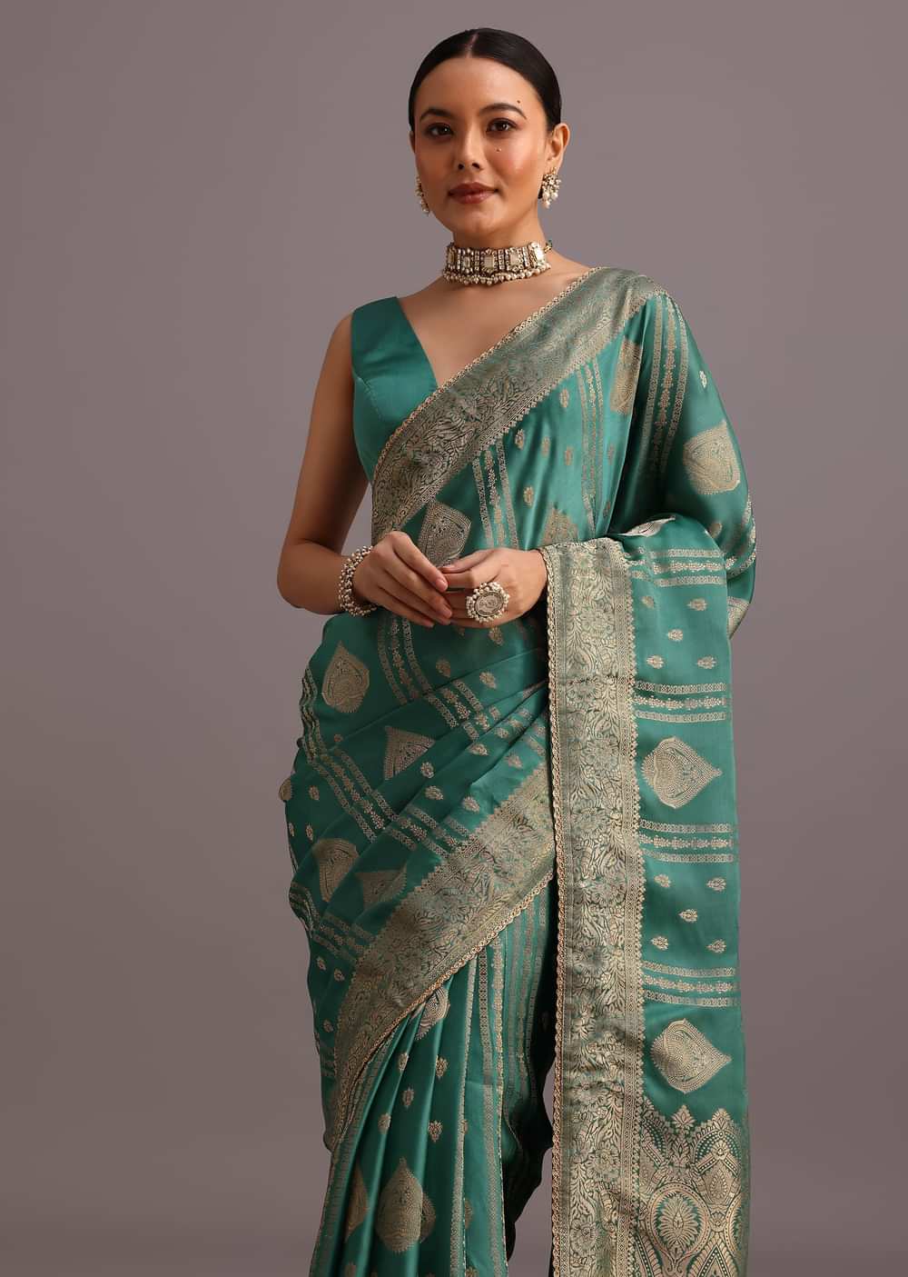 Teal Zari Work Satin Silk Woven Saree And Brocade Border