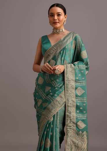 Teal Zari Work Satin Silk Woven Saree And Brocade Border