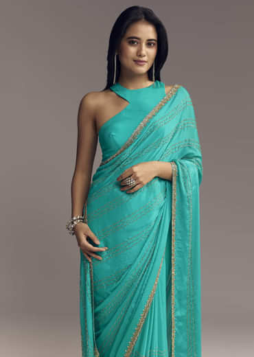 Turquoise Blue Embroidered Chinon Saree With Wavy Border
