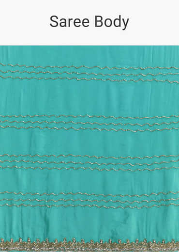 Turquoise Blue Embroidered Chinon Saree With Wavy Border