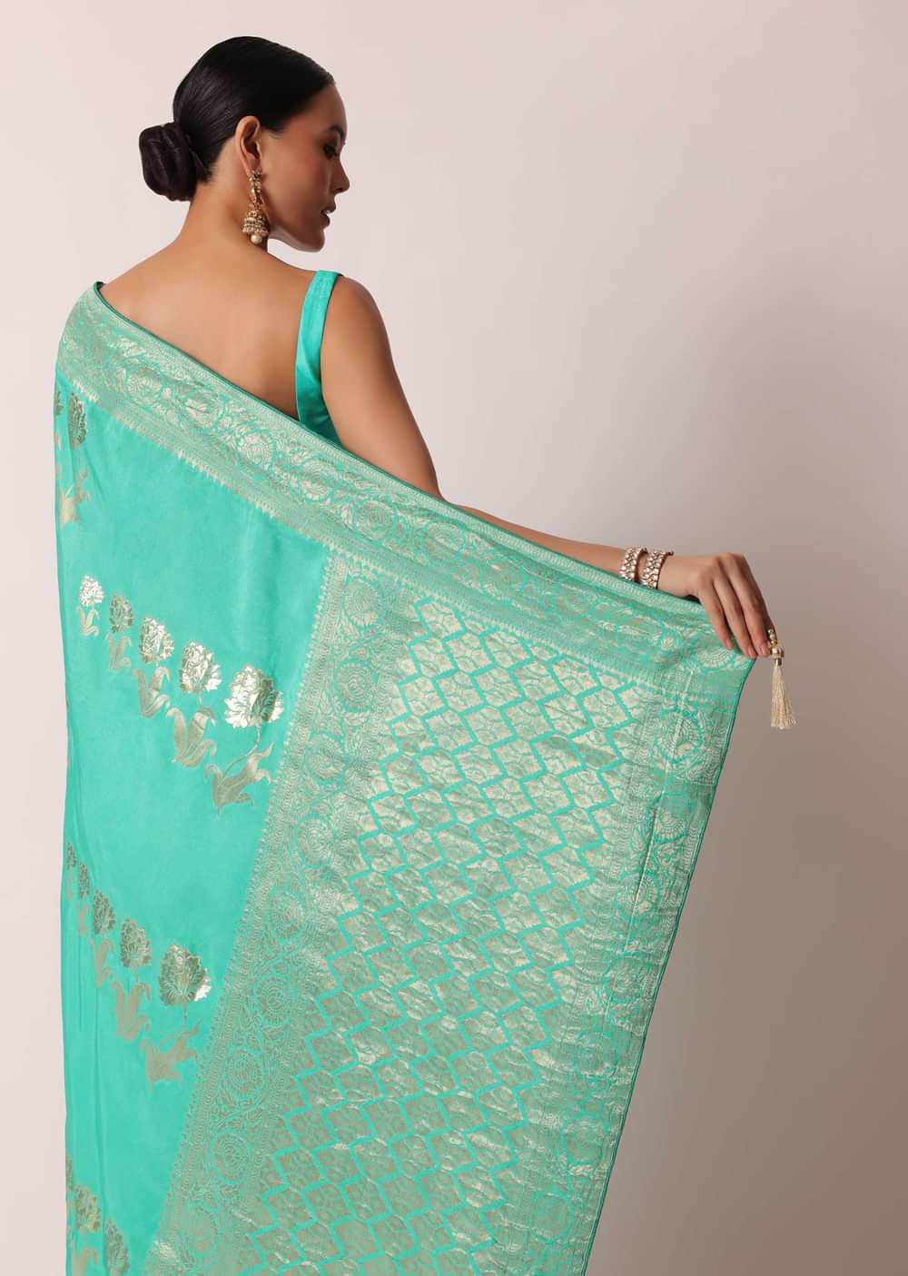 Turquoise Banarasi Saree With Floral Jaal Zari Pallu And Unstitched Blouse Piece