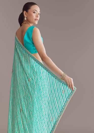 Turquoise Blue Chinon Saree With Leheriya And Gota Work
