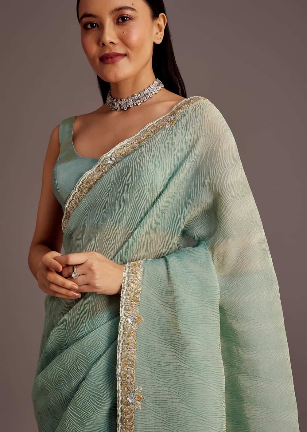 Turquoise Blue Crush Tissue Cutdana Work Saree With Embroidered Border