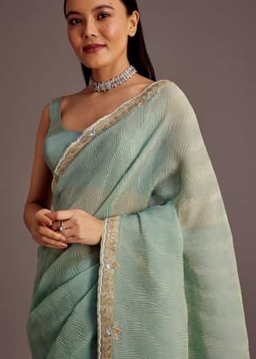 Turquoise Blue Crush Tissue Cutdana Work Saree With Embroidered Border