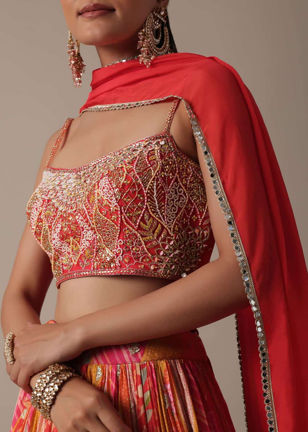 Vibrant Orange Lehenga Set With Embroidered Choli