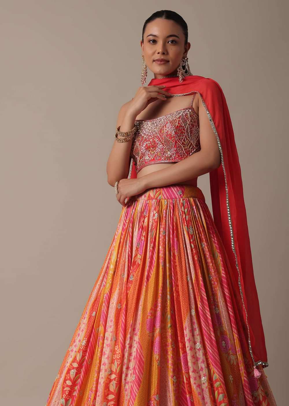 Vibrant Orange Lehenga Set With Embroidered Choli