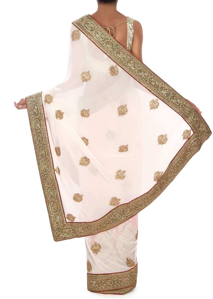 White and red saree in moti embroidery only on Kalki