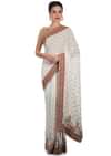 White georgette saree adorned with sequins and zari work only on Kalki