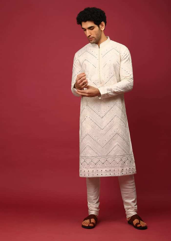 White Kurta Set In Raw Silk Heavily Embroidered With Resham And Mirror Embroidery In Floral And Chevron Design