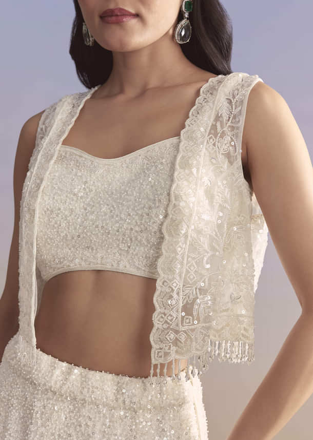 White Net Bridesmaid Lehenga With Sequins Work And Embellished Jacket