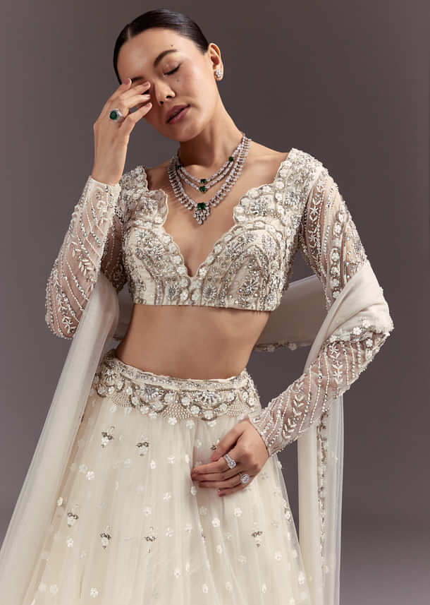 White Net Lehenga Set With Embellished Blouse And Dupatta