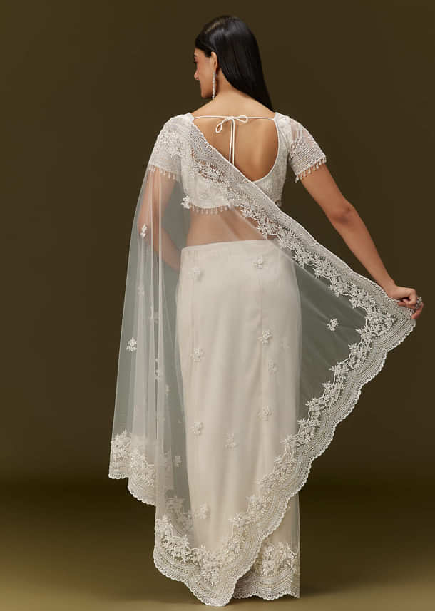 White Net Saree With All Over Embroidery