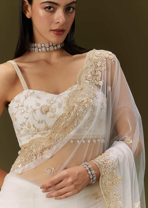 White Net Heavy Embroidered Saree With Embellished Border