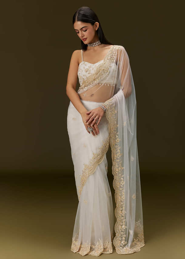 White Net Heavy Embroidered Saree With Embellished Border