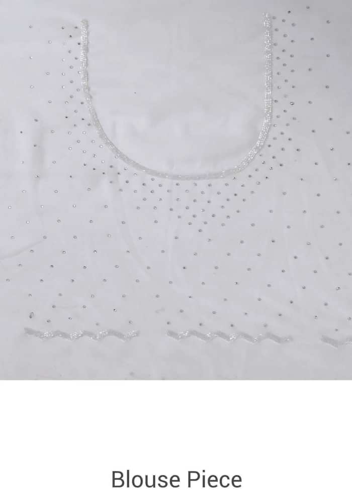 White saree with kundan and kardana adorn border only on Kalki