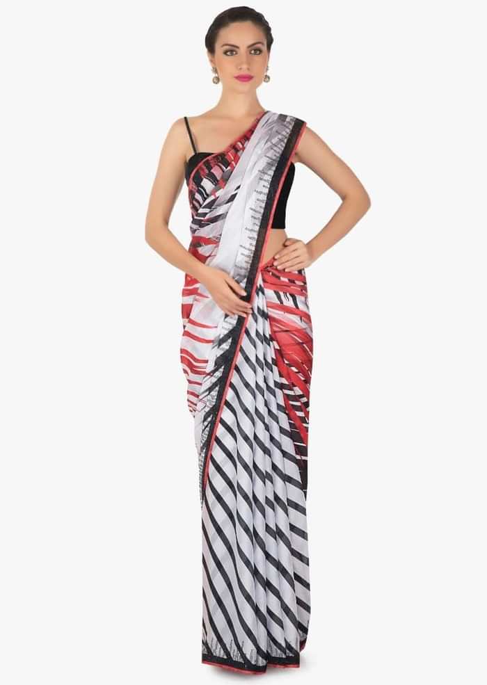 White and black stripe print with black kundan along the border only on Kalki