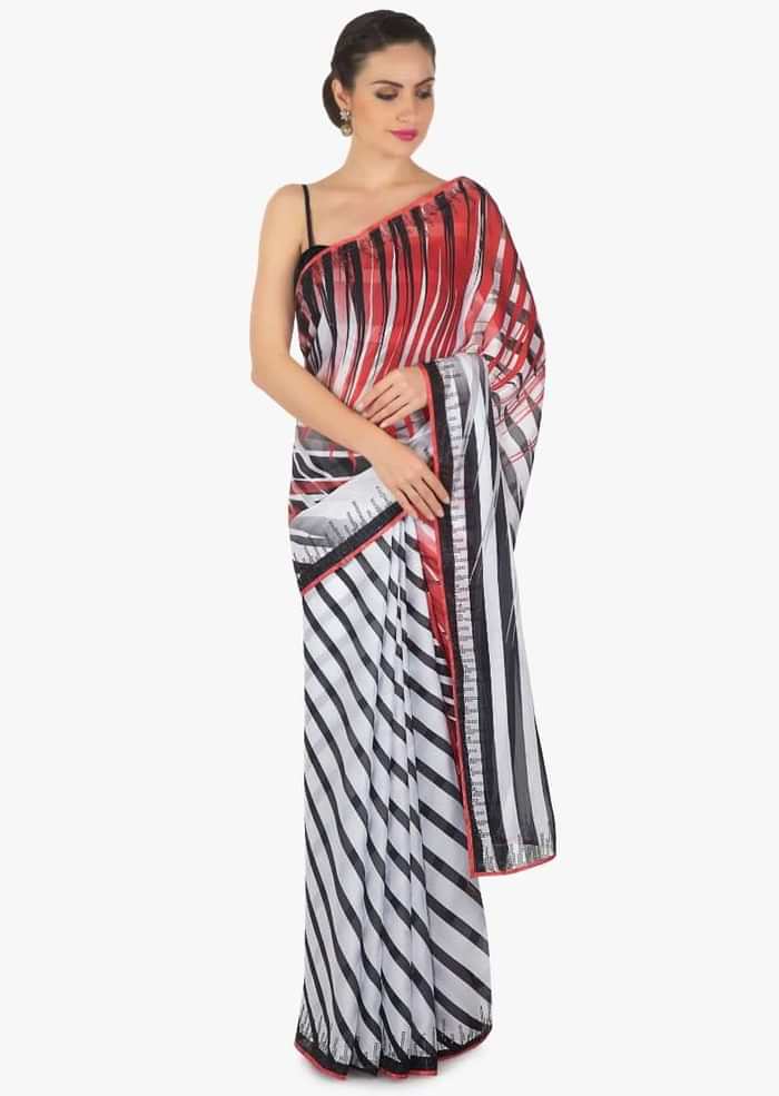 White and black stripe print with black kundan along the border only on Kalki
