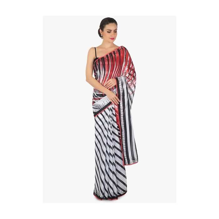 White and black stripe print with black kundan along the border only on  Kalki