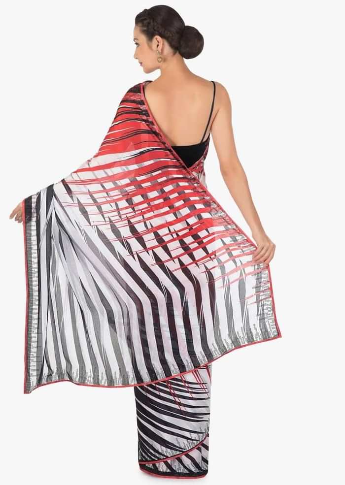 White and black stripe print with black kundan along the border only on Kalki
