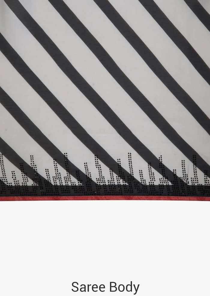 White and black stripe print with black kundan along the border only on  Kalki