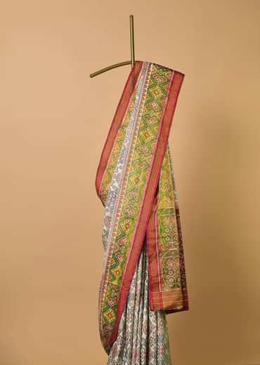 White Cotton Silk Saree With Ikat Patola Work And Unstitched Blouse Fabric