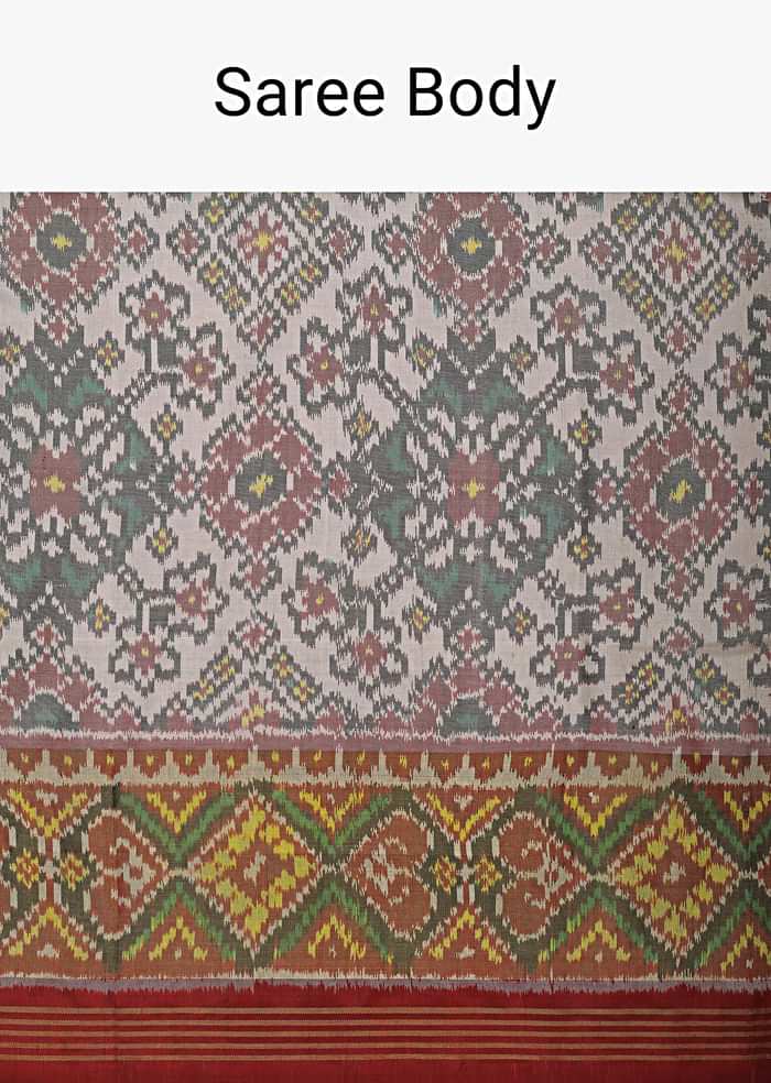 White Cotton Silk Saree With Ikat Patola Work And Unstitched Blouse Fabric