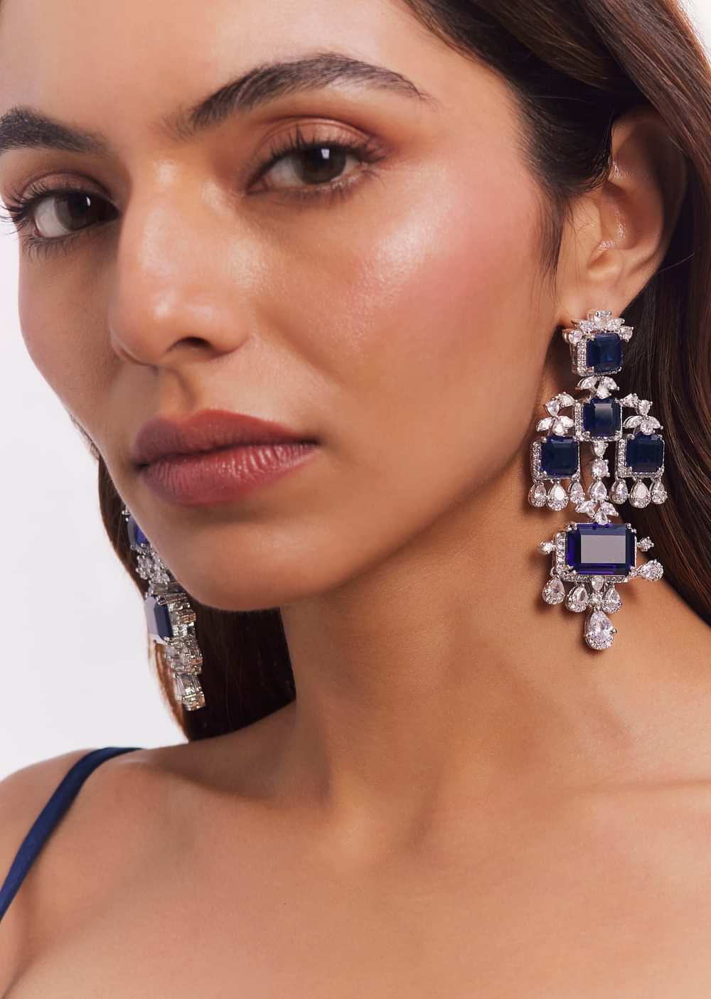 White Finish Zircon And Blue Stone Dangler Earrings