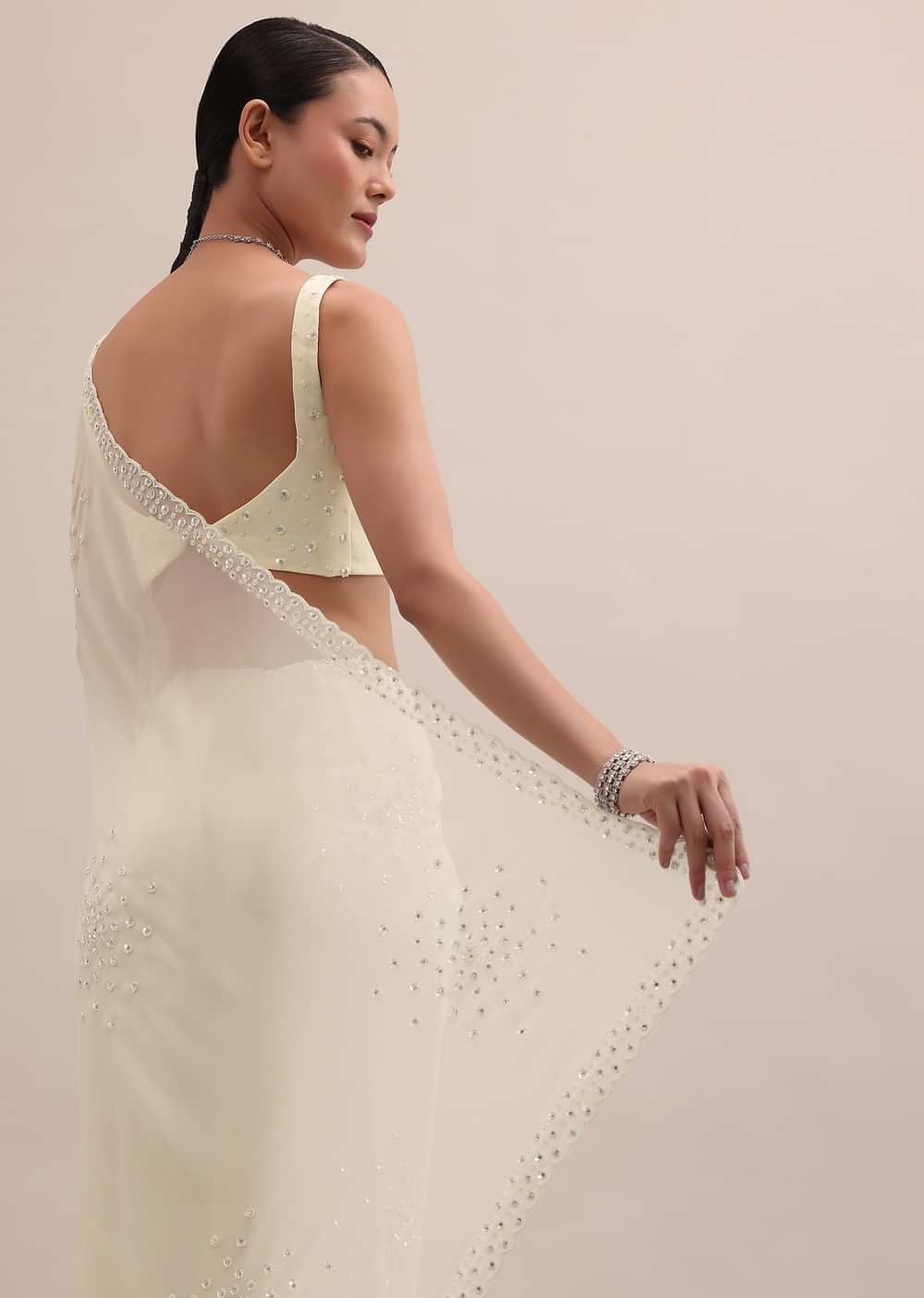 White Georgette Saree In Sequins With Unstitched Blouse